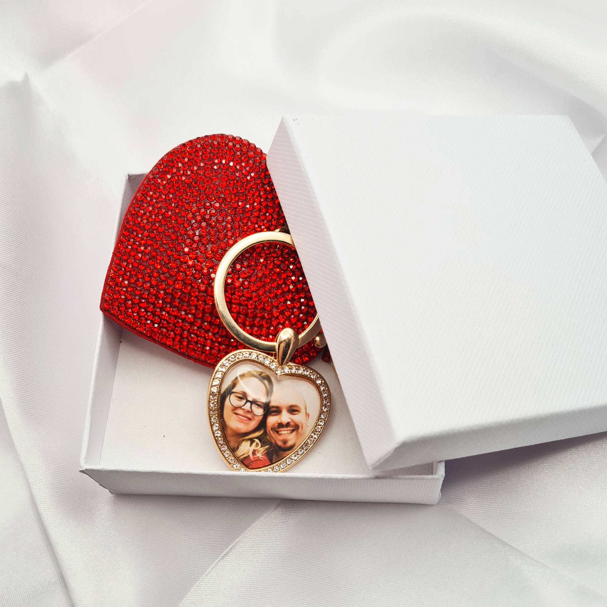 Big red heart with gold heart shaped pendant with a personalised photo in glass inside a box