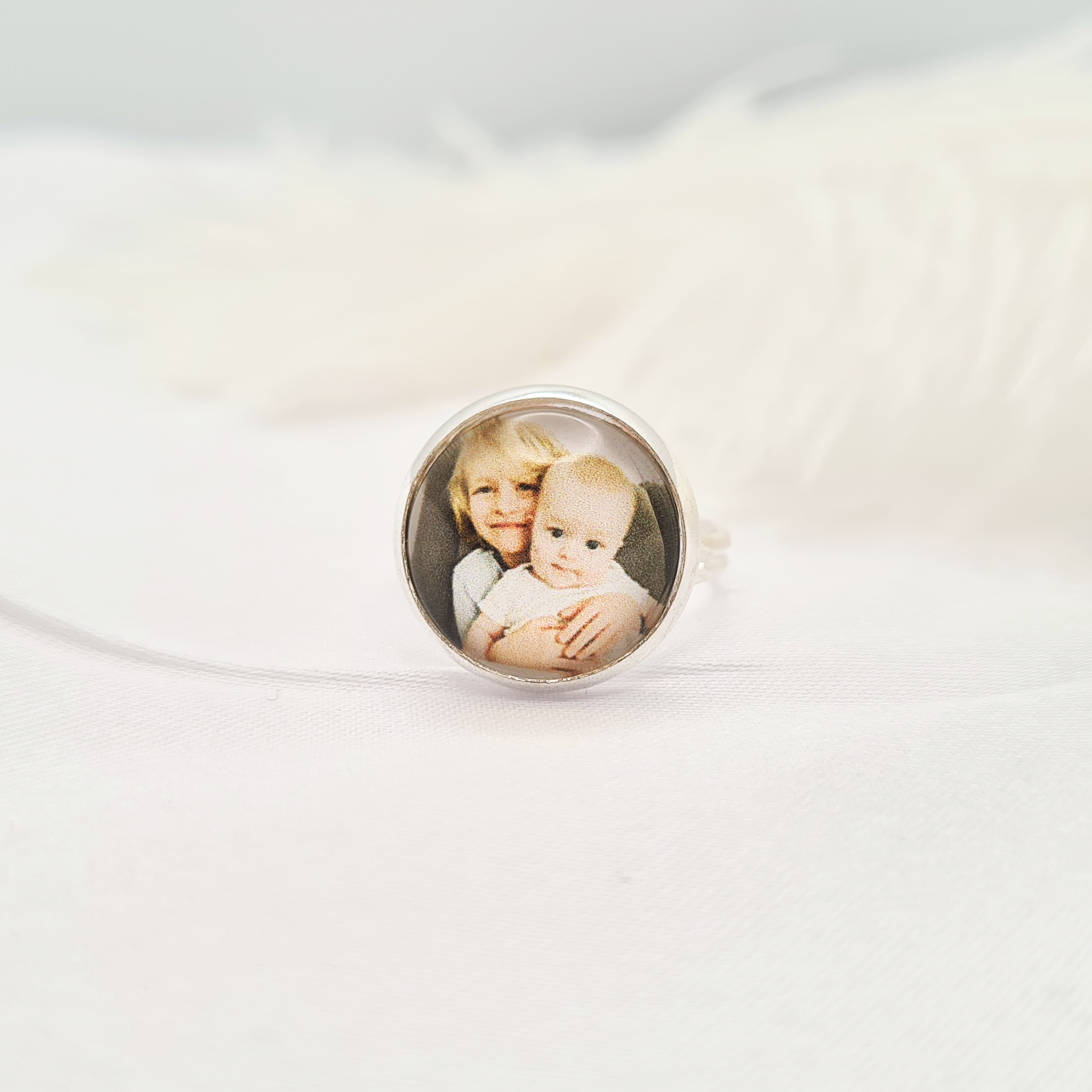 Silver ring personalised with a photo set in glass