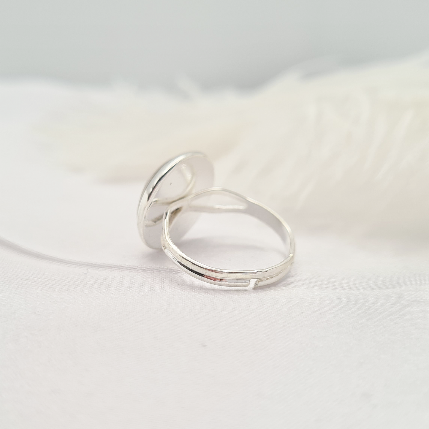 Silver ring back side showing adjustable ring
