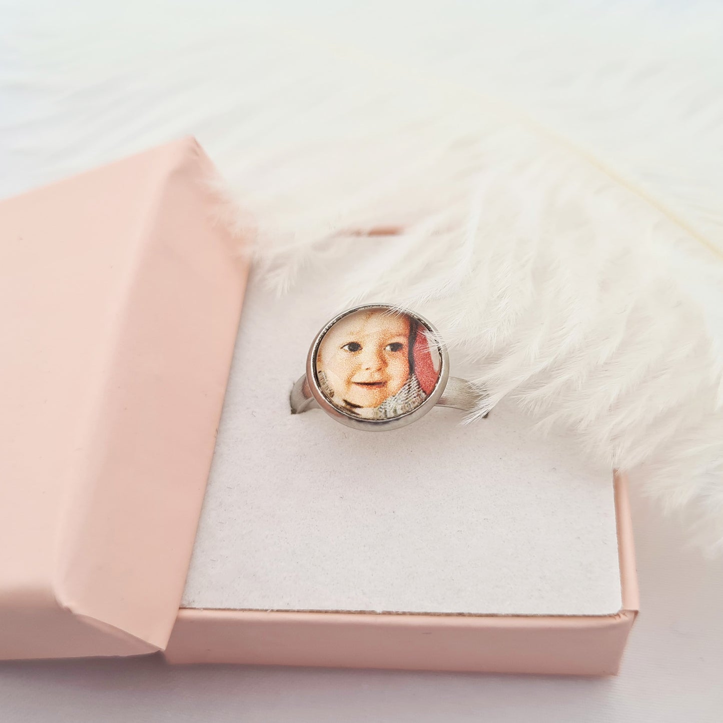 Stainless steel ring personalised with a photo set in glass inside pink decorative box