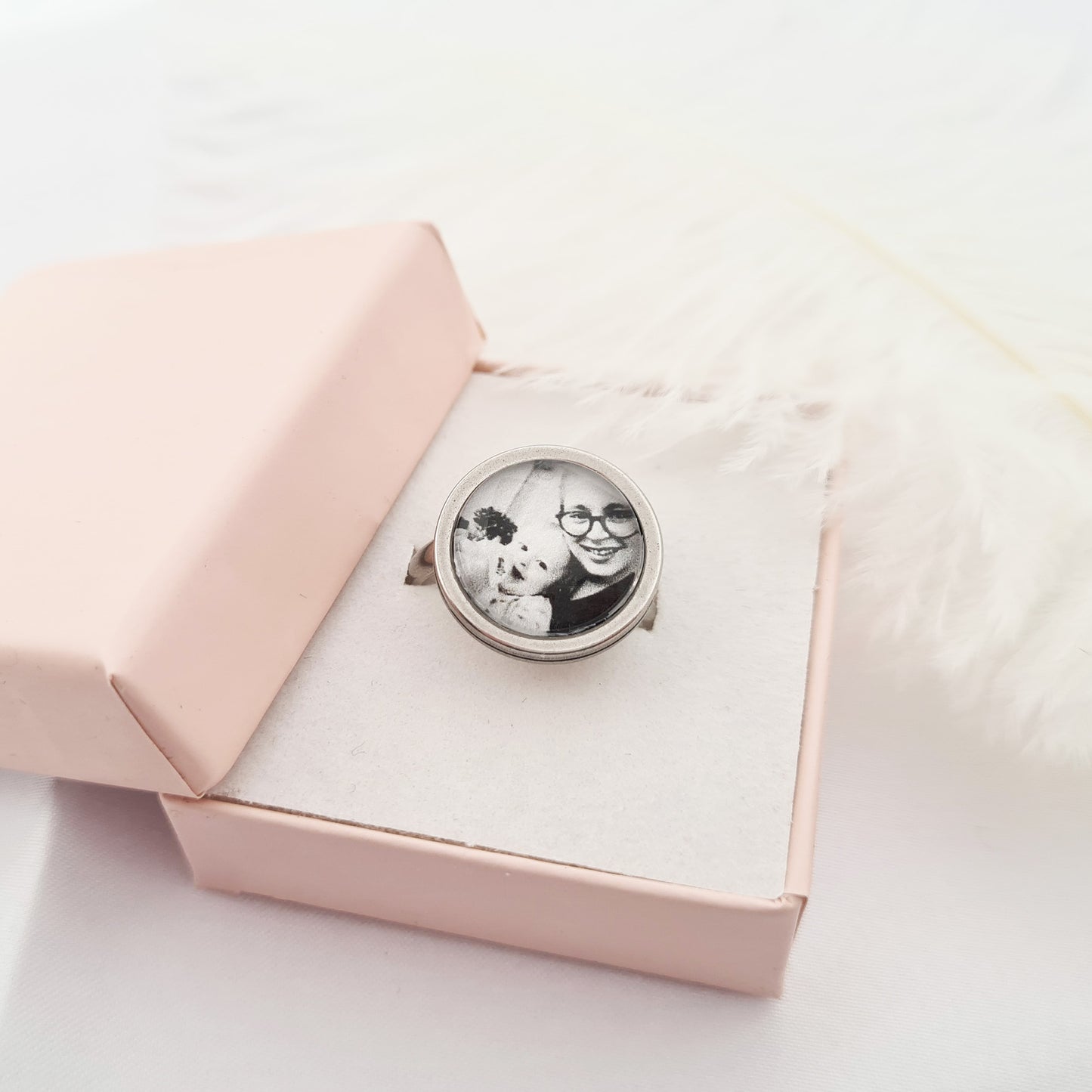 Stainless steel ring with personalised photo set in glass in a pink decorative box