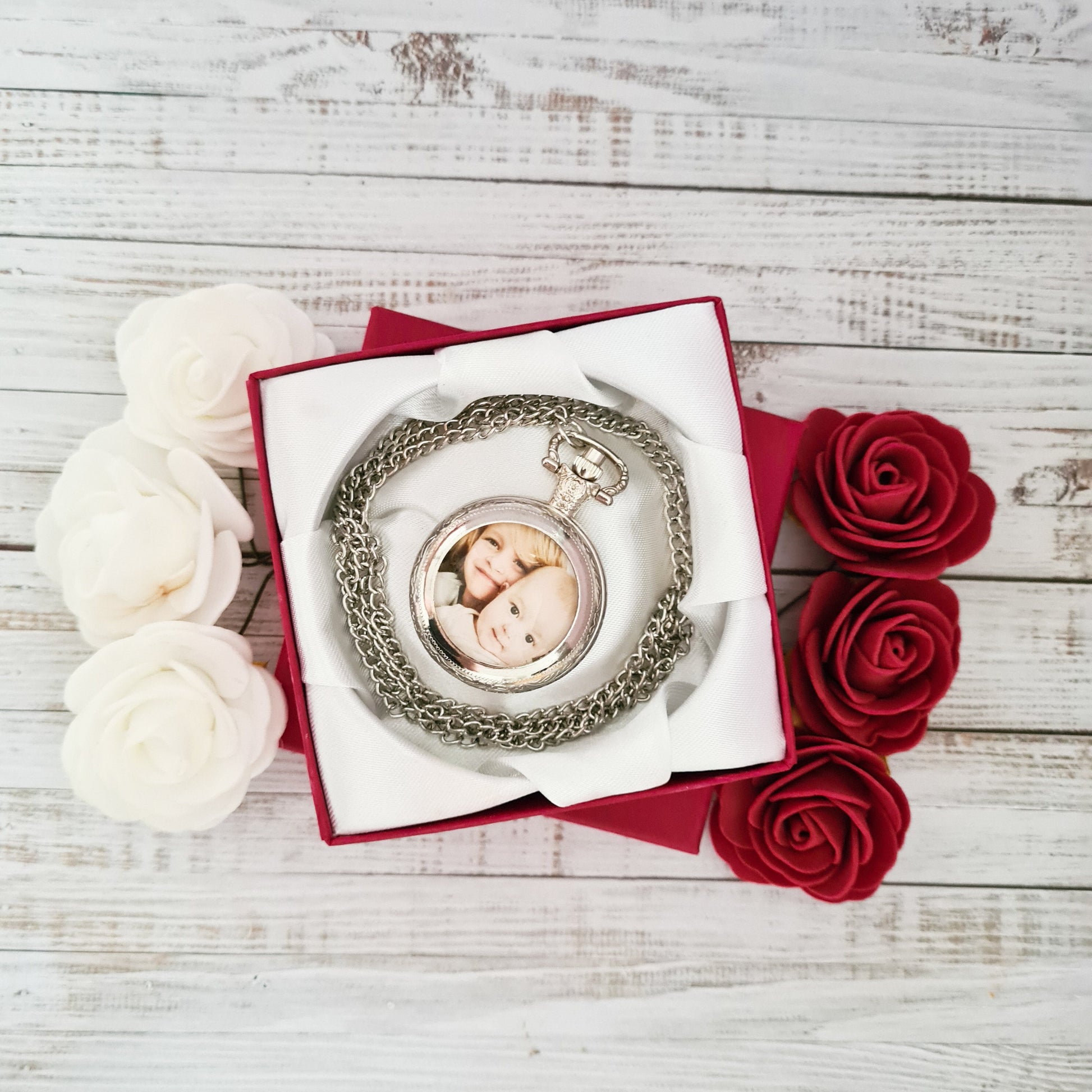 Silver pocket watch with chain personalised with photo set in glass inside a red gift box