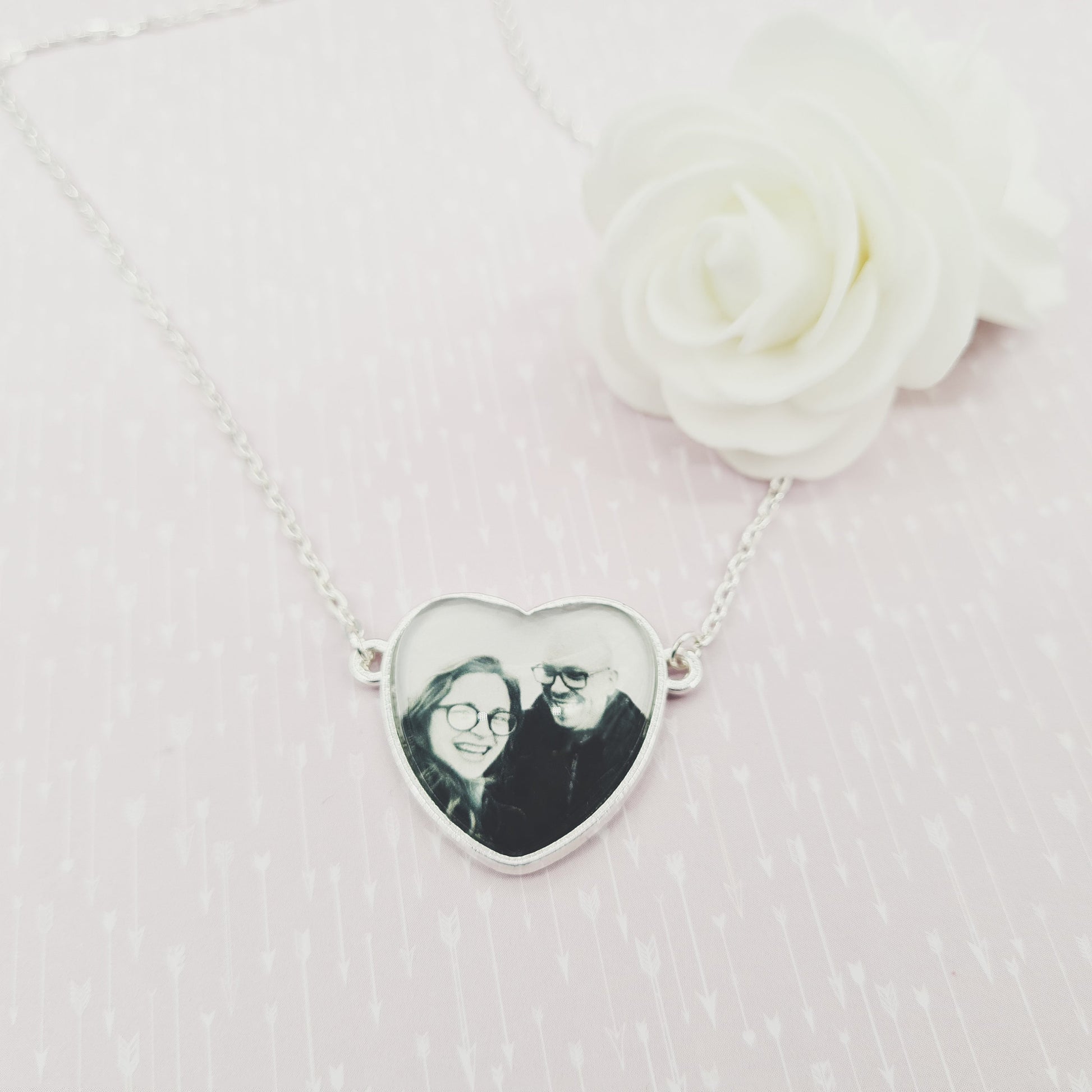 Heart shaped pendant personalised with a photo set in glass