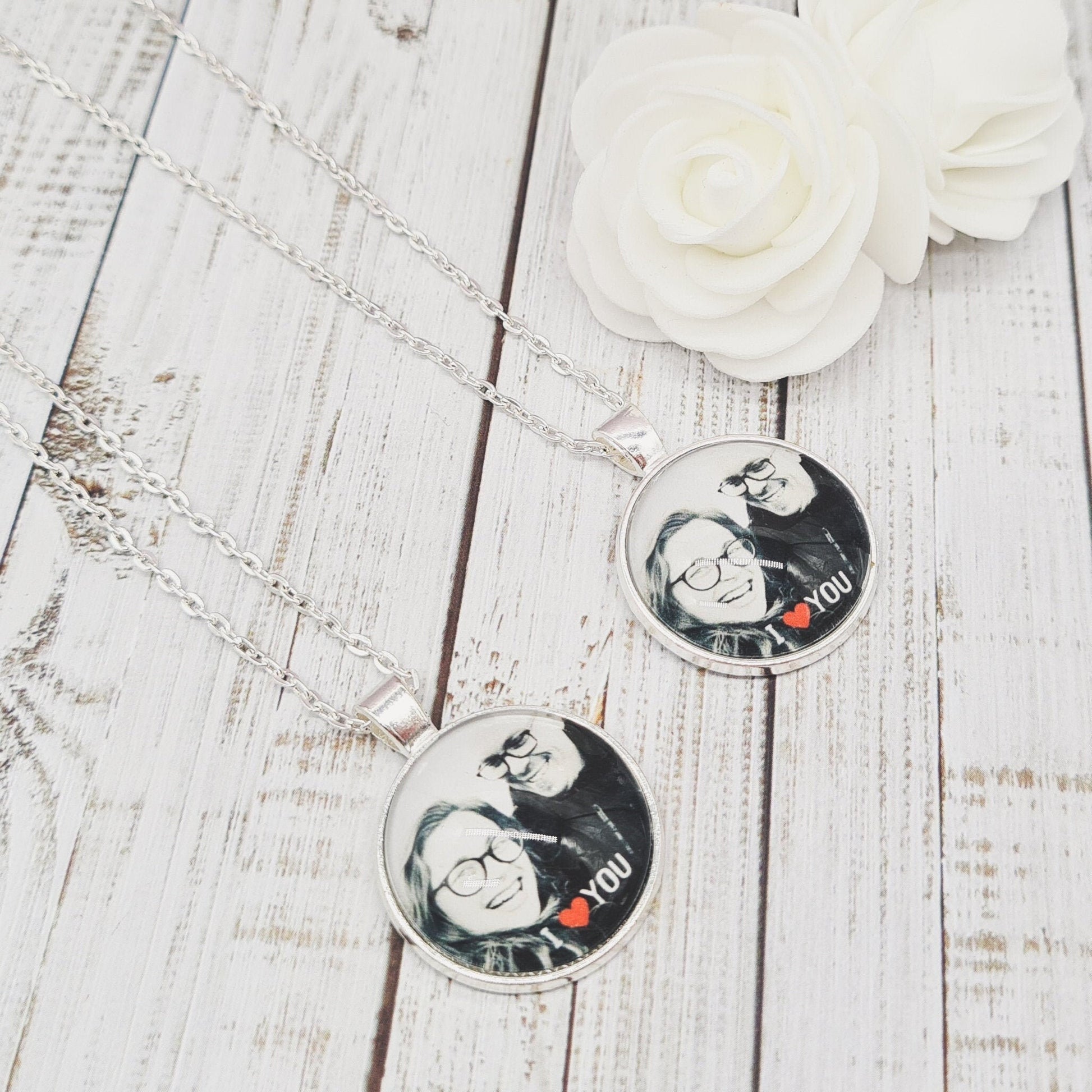 Couples duo silver necklaces personalised with photos set in glass