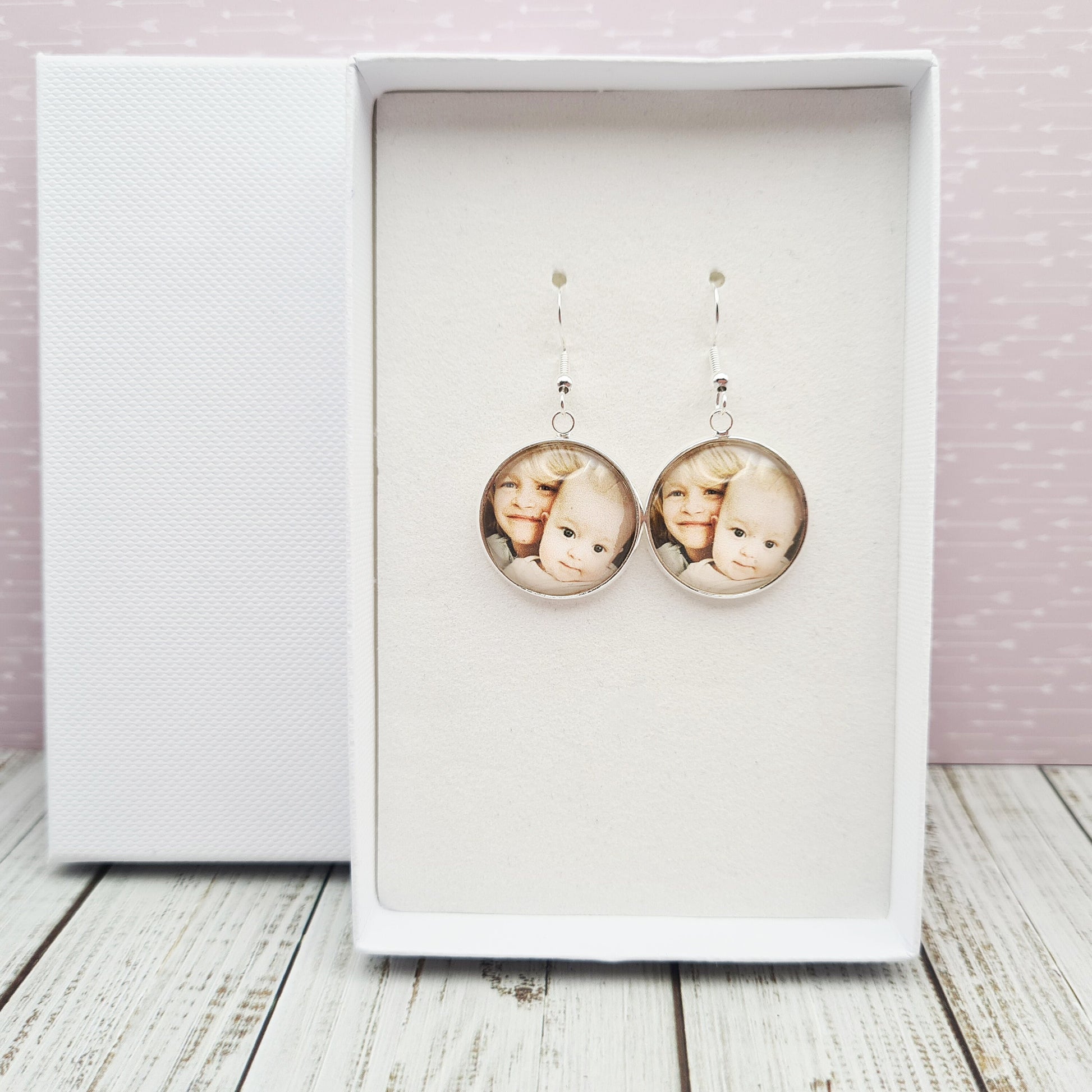 Silver earring set with personalised photo set in glass inside a white gift box